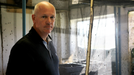 AgriProtein founder Jason Drew next to one of the fly cages at a fly factory.